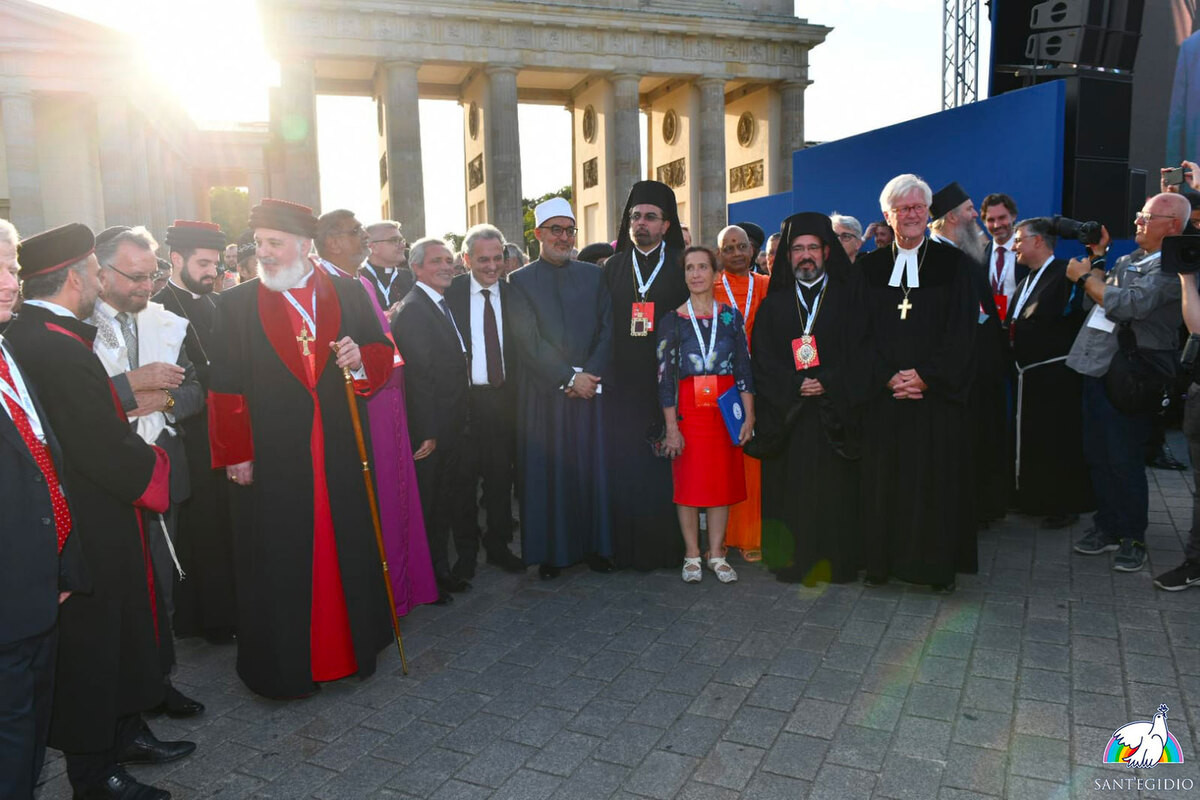 Weltfriendestreffen der Religionen in Berlin, September 2023 - wenigstens die Studierendenvertreterin ist eine Frau