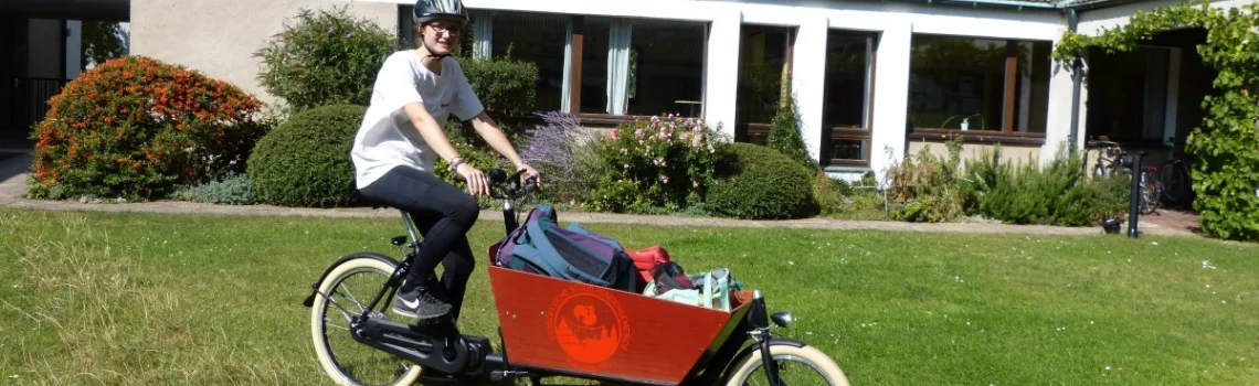 Lasten miteinander tragen - oder unserem E-Bike-Lastenrad anvertrauen